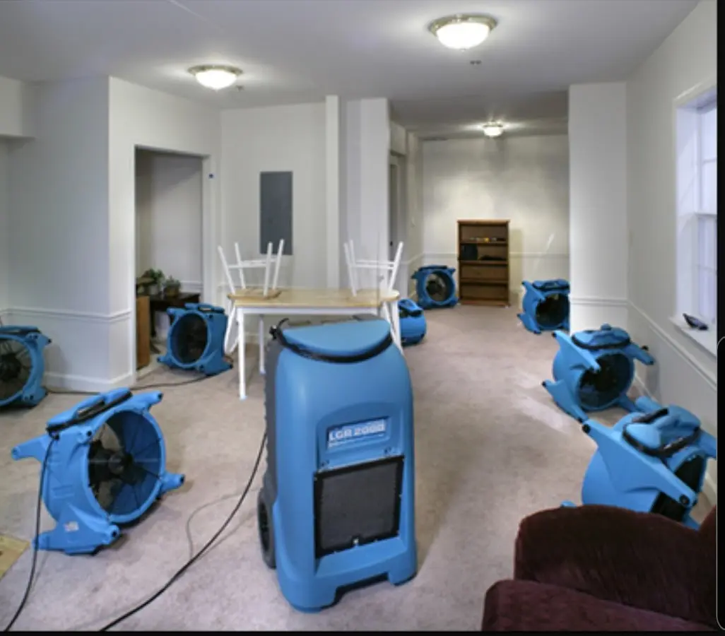 Air movers and dehumidifier setup for Water Damage Restoration in Maryville